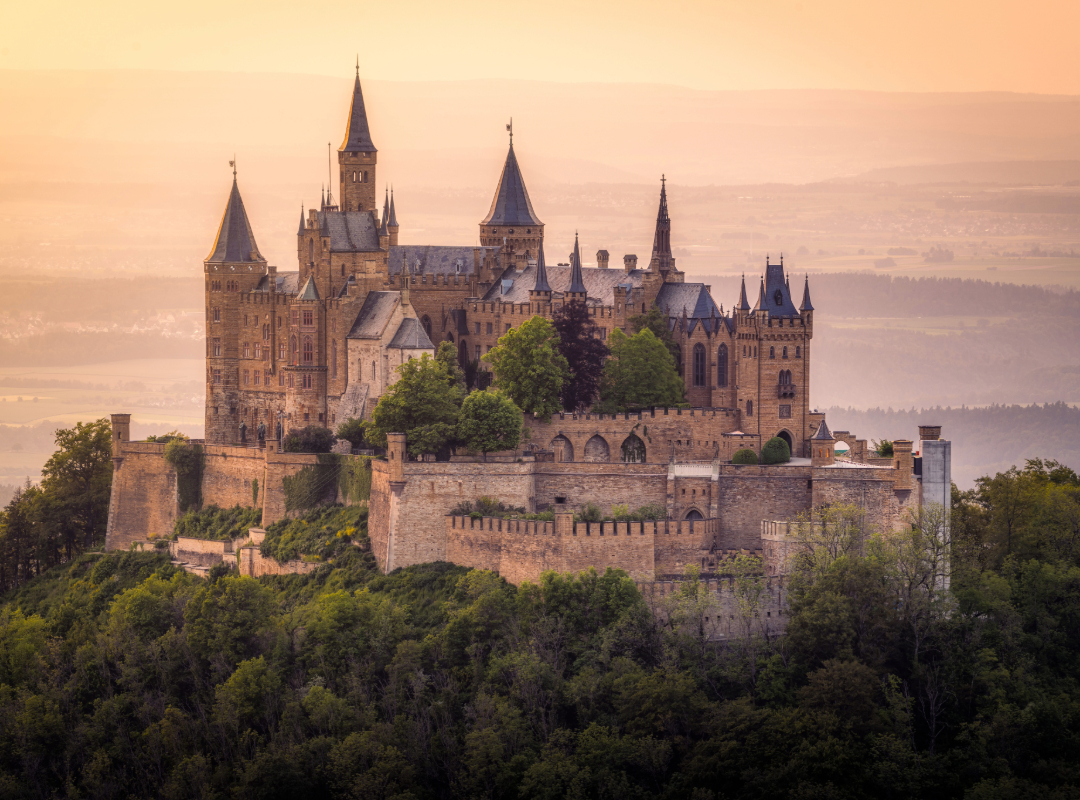 Fairytale-like Hohenzollern Castle atop a wooded hill, Baden-Württemberg