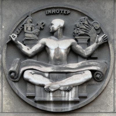 "Ancient stone relief carving of Imhotep, one of the historical figures who changed the world - Egyptian polymath who designed the first pyramid and became a god of medicine"