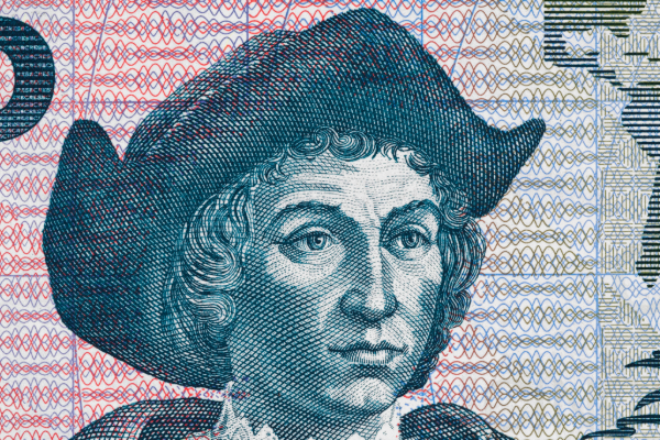 Close-up macro of Christopher Columbus portrait on El Salvador 5 Colones banknote (1997), featuring detailed engraving of the famous explorer.