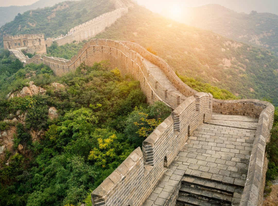 world landmark Great Wall of China winding through rugged mountain terrain