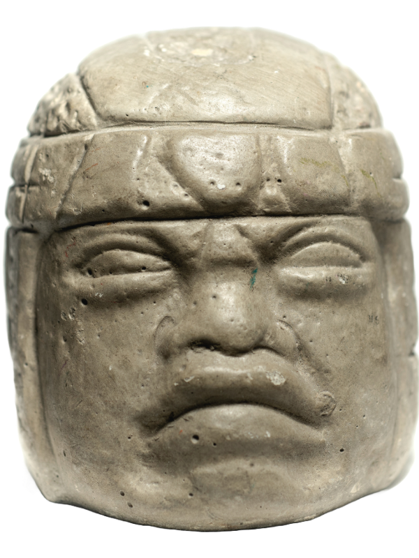 An Olmec colossal head, a monumental basalt sculpture representing an Olmec ruler. The statue, with its unique features and intricate headdress, symbolizes the power and artistry of the ancient Olmec civilization, which thrived in the Gulf Lowlands of Mexico.