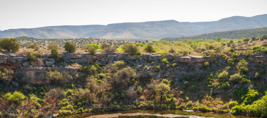 "Montezuma Well, a natural limestone sinkhole in Arizona, used by the Sinagua people from approximately 1050 to 1425 CE, showcasing its role as a vital water source and cultural site during the pre-Columbian era."
