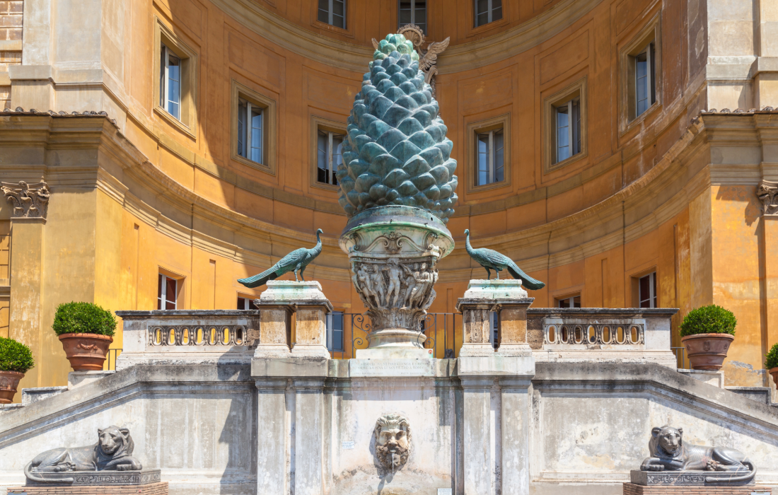 What Does the Pine Cone Symbol in Ancient Art Represent?