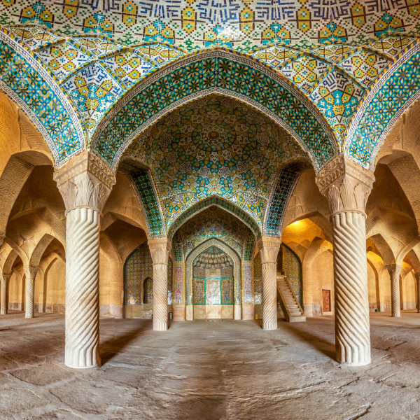 Vakil Mosque’s prayer hall in Shiraz, Iran, with floral tilework and 48 stone columns. Countries that start with I. 