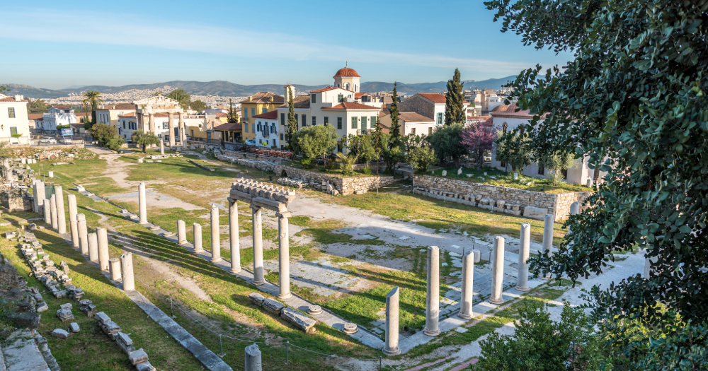 Aerial view of the Roman Agora in Athens showing colonnaded courtyard, the Tower of the Winds, and ancient ruins