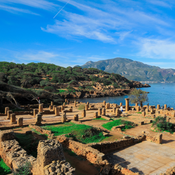 Roman baths and theater ruins in Tipasa, Algeria, overlooking the Mediterranean Sea. Countries that start with a